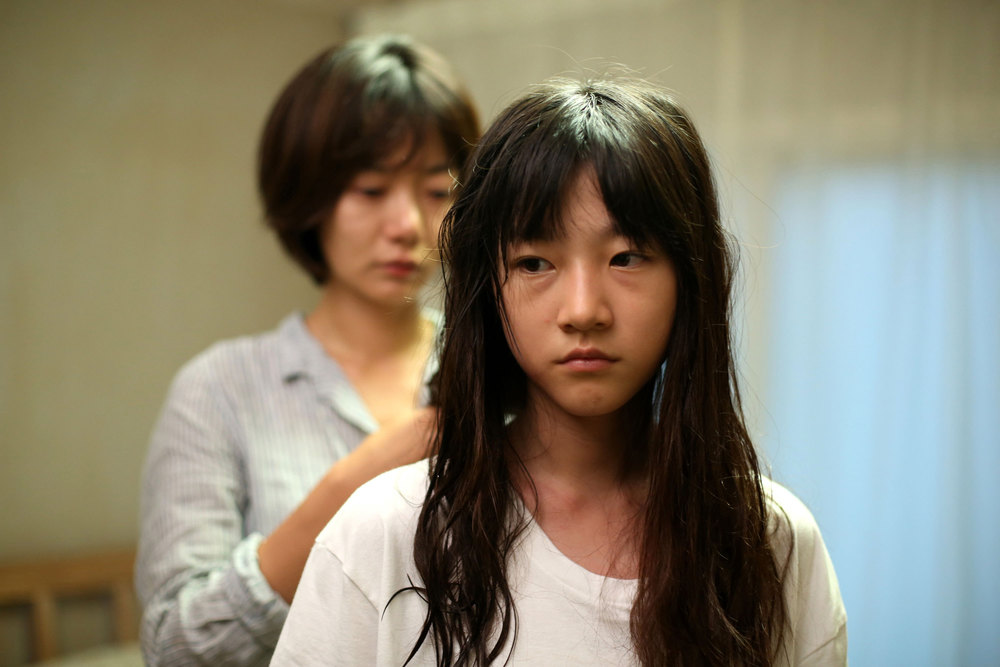 Bae Doona takes Kim Sae-ron under her wing in  A Girl At My Door ( 도희야 &nbsp;–   &nbsp;Dohui-ya).